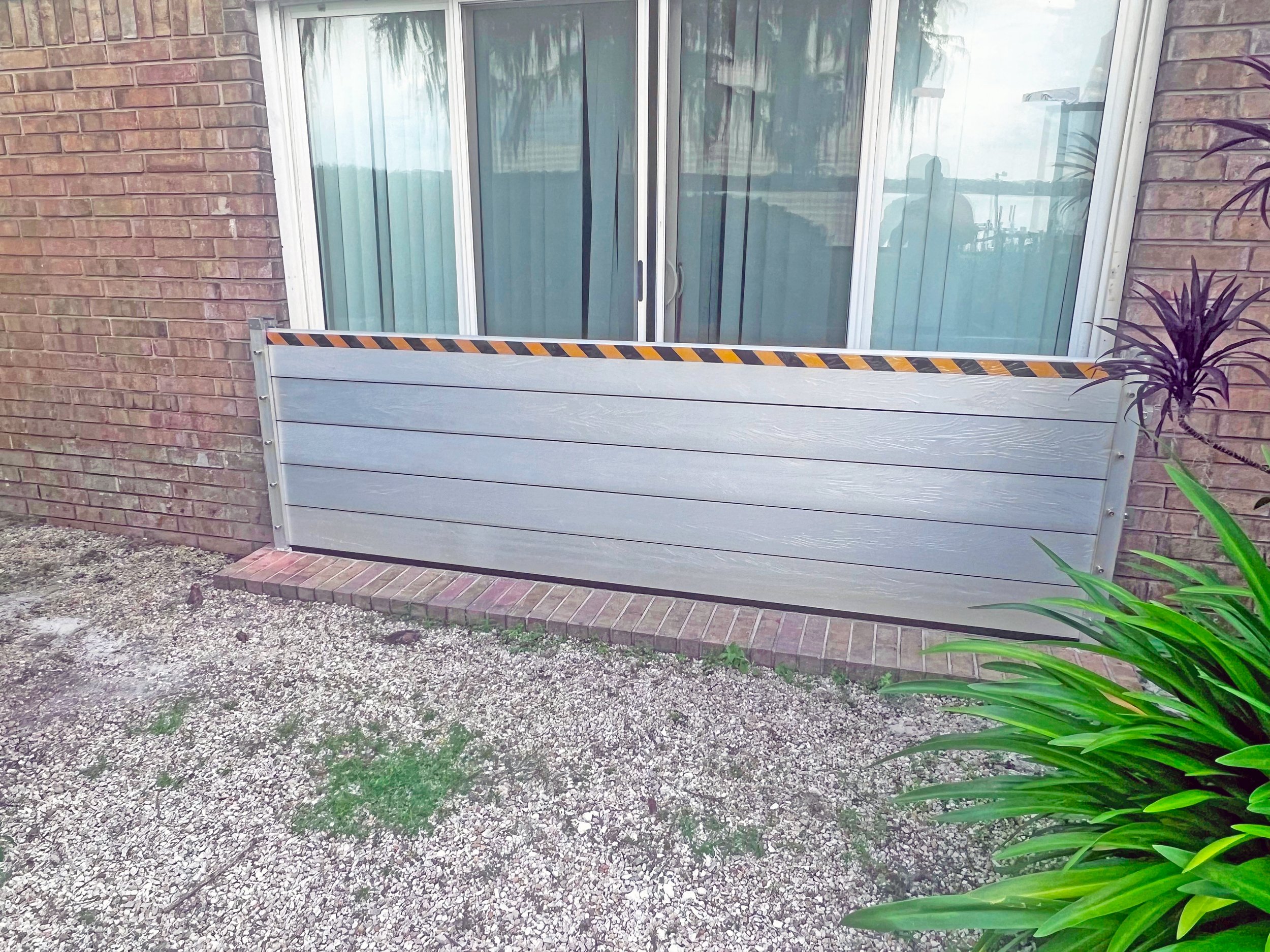 sliding doors flood gate